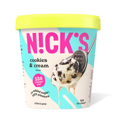 Pint of N!CK'S Cookies & Cream light ice cream. The label highlights 'no added sugar' and '330 calories/pint'. A spoon holds a scoop of vanilla ice cream with dark cookie pieces.